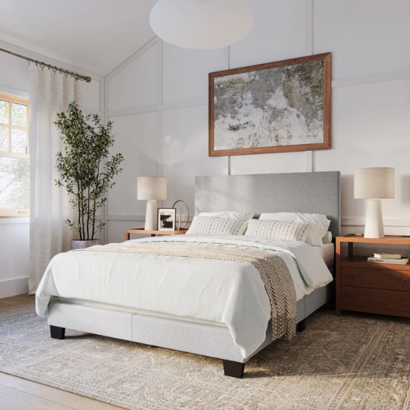 Full-size light grey upholstered bed with soft polyester fabric, tall foam-padded rectangular headboard, and sleek modern design.