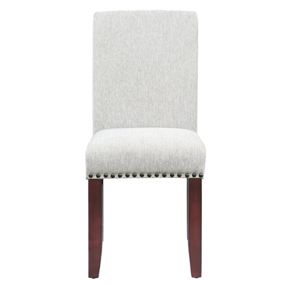 Light grey upholstered Parsons chair with scrolled high back, antique bronze nailhead trim, and solid wood legs