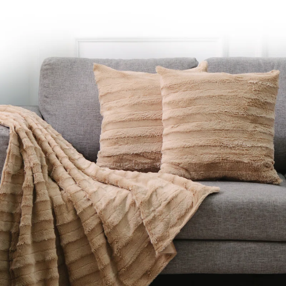 Set of two light tan faux fur throw pillows, 18x18 inches, square decorative cushions with soft microfiber filling—ideal for neutral-toned sofas, beds, and minimalist interiors