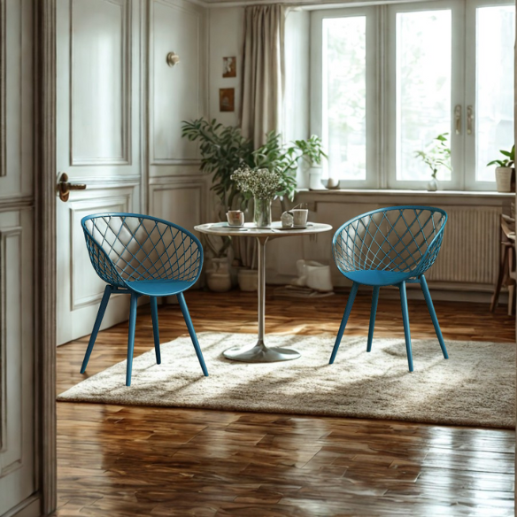 Set of two matte blue mid-century modern dining chairs with molded plastic seats and angled steel legs.