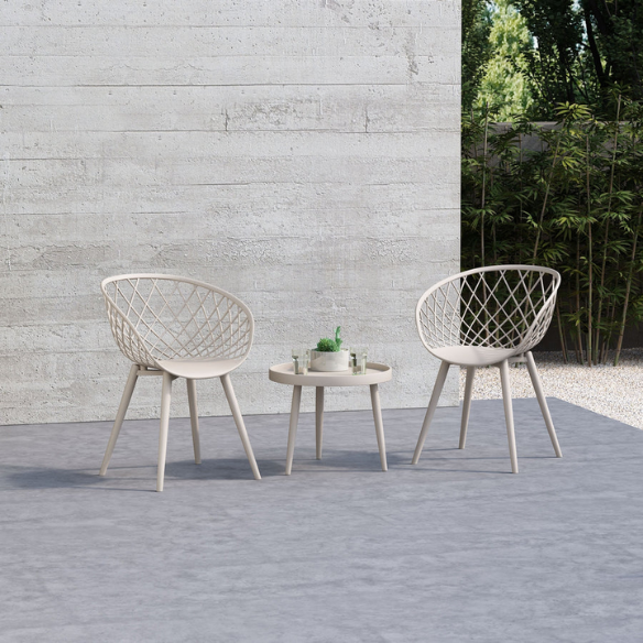 Set of two matte white mid-century modern dining chairs with molded plastic seats and black metal legs.