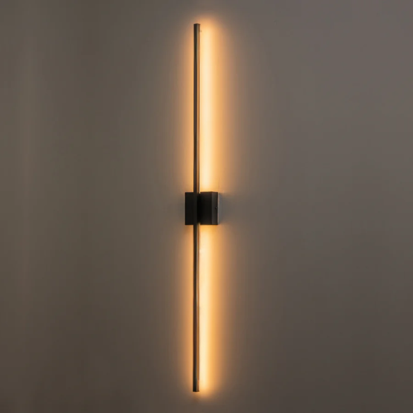 Modern black linear LED wall sconce with matte finish, designed for vertical or horizontal installation in contemporary interiors