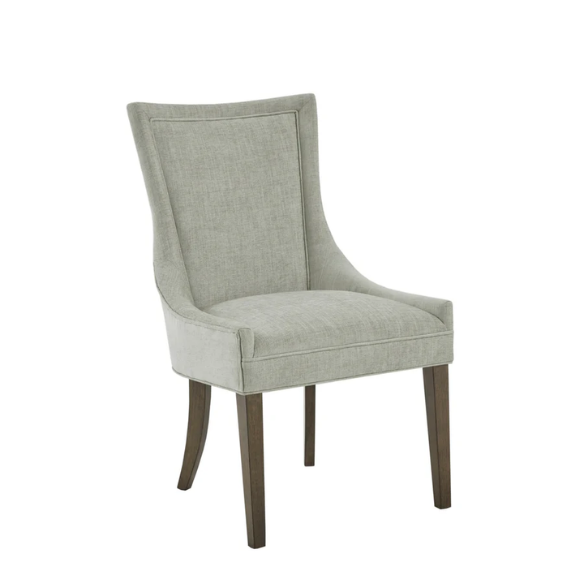 Set of 2 upholstered armless dining chairs in muted green with solid wood legs, high backrest, and elegant piping detail.