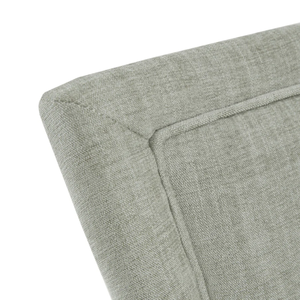 Set of 2 upholstered armless dining chairs in muted green with solid wood legs, high backrest, and elegant piping detail.
