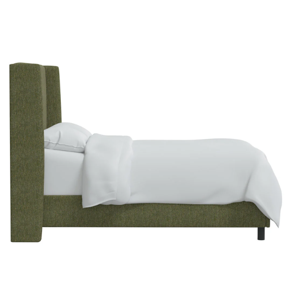Olive green king-size upholstered bed in tweed fabric with wingback headboard and low-profile black metal legs.