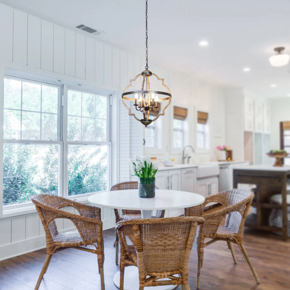 Rustic farmhouse 4-light chandelier with distressed metal frame and candle-style bulbs, hanging ceiling light for dining room or entryway