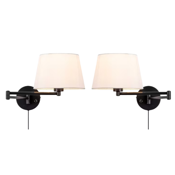 Set of 2 black swing arm wall sconces with white linen shades, adjustable arms, and plug-in or hardwired installation for bedroom or living room use