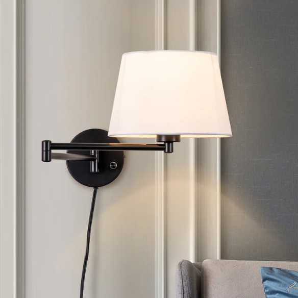 Set of 2 black swing arm wall sconces with white linen shades, adjustable arms, and plug-in or hardwired installation for bedroom or living room use