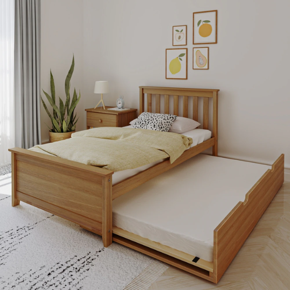Modern solid wood twin bed with pull-out trundle in pecan finish, featuring slatted headboard and footboard – perfect for kids' rooms and sleepovers.