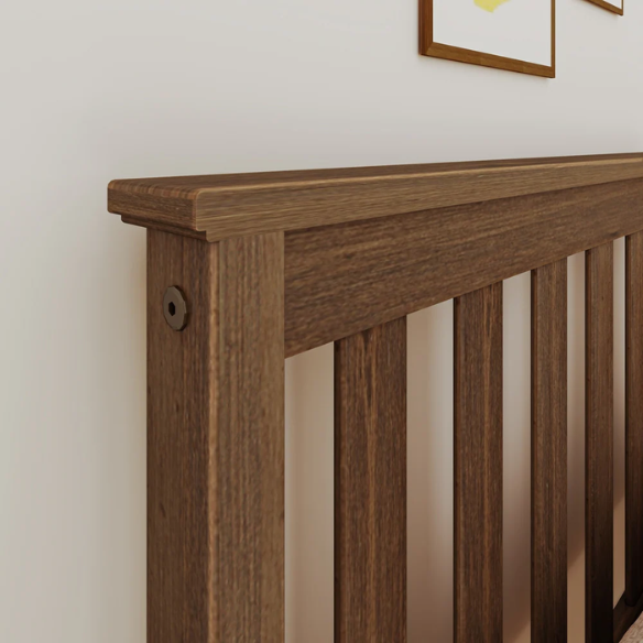 Walnut solid wood twin bed with pull-out trundle, slatted headboard and footboard, ideal for kids’ bedrooms, sleepovers, and guests.