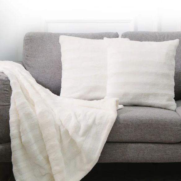 Set of two white faux fur throw pillows, 18x18 inches, square plush decorative cushions with microfiber fill—perfect for modern, minimalist, or cozy home interiors