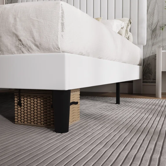White velvet upholstered queen bed with tufted rectangular headboard and low-profile frame.