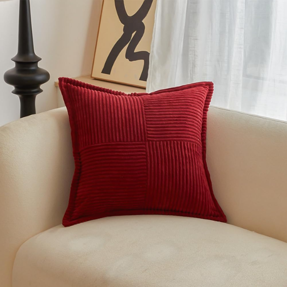 Modern red corduroy pillow cover with geometric striped pattern, square shape, and zipper closure. Ideal for home décor, living rooms, offices, and outdoor patios.