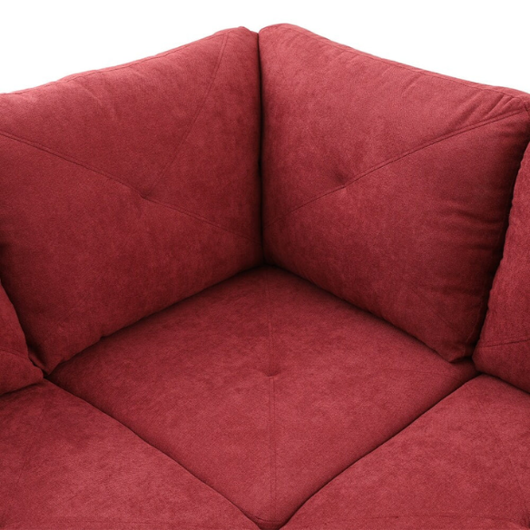 Red L-shaped sectional sofa with right-facing chaise and ottoman, microfiber upholstery and light gray wooden legs