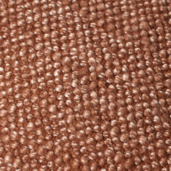 Rust cotton blend throw pillow with fringe, 22x22 square decorative cushion styled on a neutral-toned sofa for cozy, modern home décor.