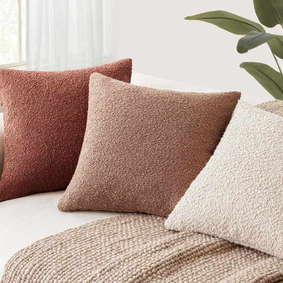 Rustic burnt orange boucle throw pillow cover with soft loop texture, 18x18 inches – cozy modern accent for sofa, bed, or armchair