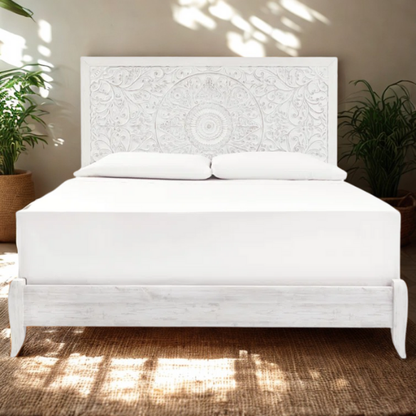Rustic white king panel bed with intricately carved medallion headboard, decorative laminate finish, and adjustable height frame