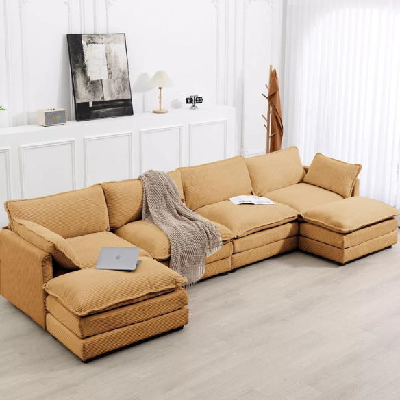 Tan corduroy 4-seat modular sectional sofa with two ottomans, featuring soft high-pile fabric, plush cushions, and a sturdy wood and metal frame for modern living spaces.