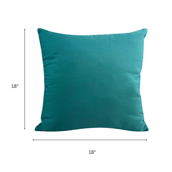 Set of two teal square throw pillows with piped edges and hidden zipper, perfect for modern or transitional home décor