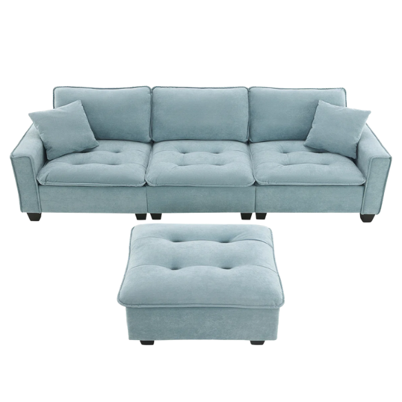 Tranquil sea blue suede L-shaped sectional sofa with tufted seat cushions, reversible chaise, removable ottoman, and two matching throw pillows
