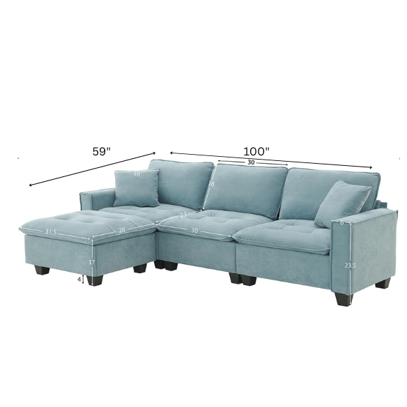 Tranquil sea blue suede L-shaped sectional sofa with tufted seat cushions, reversible chaise, removable ottoman, and two matching throw pillows