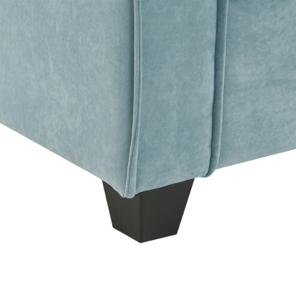 Tranquil sea blue suede L-shaped sectional sofa with tufted seat cushions, reversible chaise, removable ottoman, and two matching throw pillows