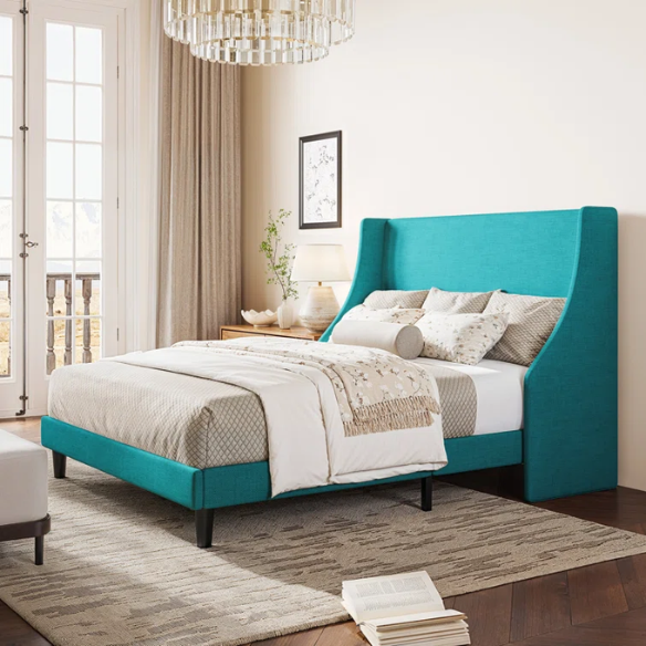 Turquoise linen upholstered queen platform bed with wingback headboard, tapered black legs, and slatted base – no box spring required