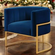 Navy velvet accent chair with a sleek gold arc base, offering stylish comfort and versatility for any space. The chair features a plush velvet seat, sturdy iron frame, and modern arc-shaped design, perfect for living rooms, bedrooms, offices, and more.