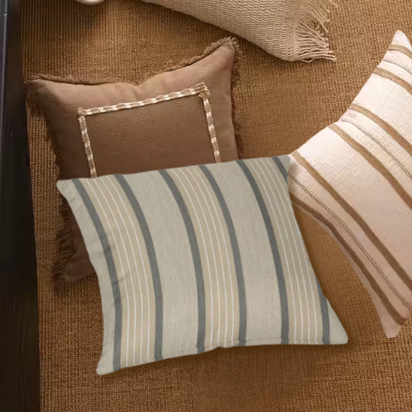 Weather-resistant striped accent pillow for indoor and outdoor use – durable, reversible, and mildew-resistant with overstuffed polyester fill, perfect for patio, deck, or living room décor.