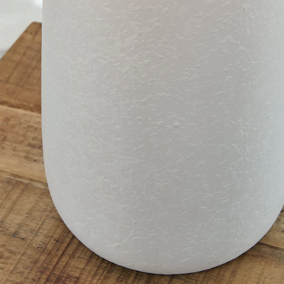 Set of two white ceramic table lamps with textured conical bases and modified drum fabric shades, 3-way switch, 26.5 inches tall.