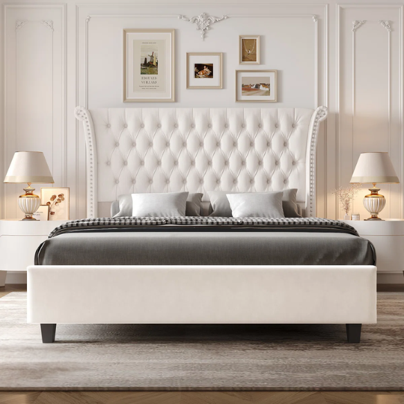 White velvet king-size platform bed with tall tufted wingback headboard, nailhead trim, and no box spring required