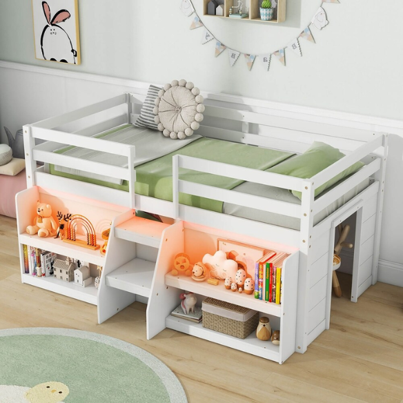 White twin low loft bed with LED lights, built-in bookshelf, under-bed storage, and stair access – ideal for kids or small bedrooms.