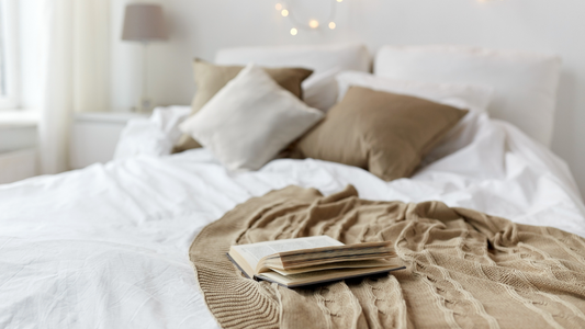 This image captures the essence of a comfy bed, where comfort meets style in a serene and inviting bedroom setting.