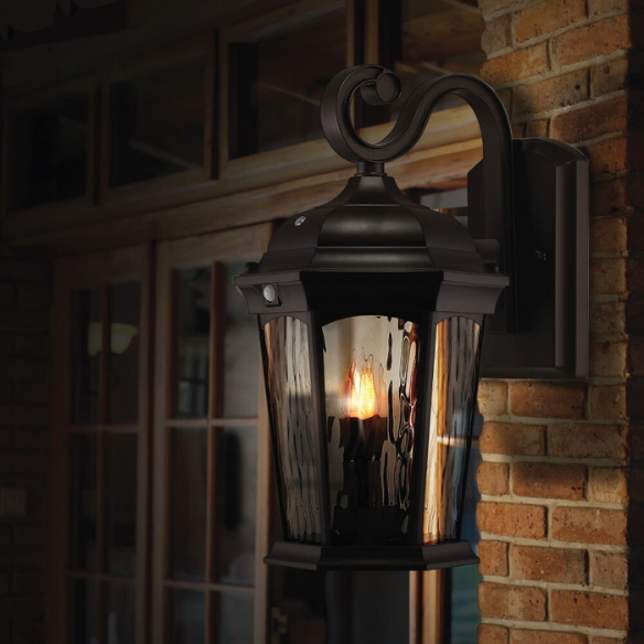 Lighting Flame Lantern with Motion Sensor & Integrated Photocell – 3000K LED Security Light with Water Glass and Bronze Finish