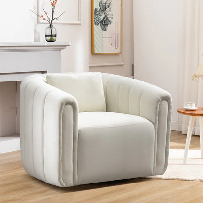 Beige barrel swivel chair upholstered in soft velvet fabric, featuring a 360-degree rotating base, a lumbar pillow for support, and high-density foam cushioning. The elegant chair has a neutral beige color, sleek barrel design, and sturdy metal swivel base with a solid wood frame. Perfect for adding comfort and sophistication to living rooms, nurseries, or bedrooms.
