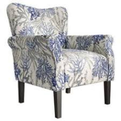 A stylish Blue Coral Accent Chair featuring a vibrant blue coral fabric with a unique pattern. The chair has a tufted wingback design, gracefully tapered wood legs, and padded armrests for optimal comfort. It combines modern sophistication with a classic aesthetic, ideal for any living room, office, or reading nook.