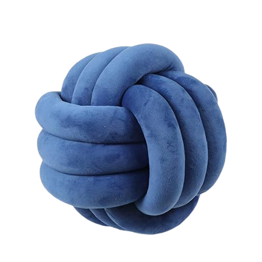 Close-up of blue accent pillow featuring a soft, raised geometric pattern. Stylish cushion for living room or bedroom.