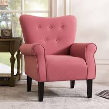 A brick red accent chair with a high backrest, gently sloped sides, and padded armrests. The chair features a solid brick red upholstery, providing a warm and elegant look. It is supported by sleek, tapered wooden legs with rubber inserts to protect floors. Perfect for relaxing, reading, or lounging, this modern yet timeless piece adds comfort and sophistication to any room in your home.