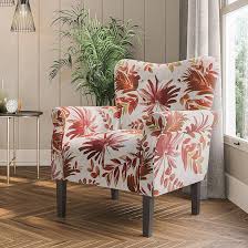 Red Floral Accent Chair featuring a vibrant red floral pattern on soft fabric upholstery with a gently sloping backrest, padded armrests, and elegant tapered wooden legs. Perfectly designed for comfort and style, ideal for living rooms, studies, or reading nooks, blending modern elegance with a timeless floral design.