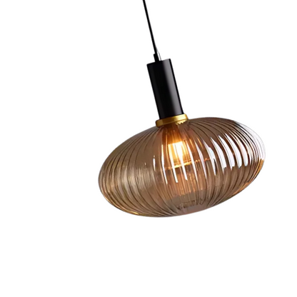 Modern amber pendant light with striped glass shade and black metal body, adjustable height chandelier for dining room, living room, and kitchen.