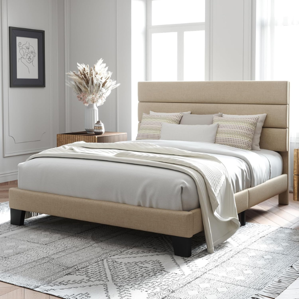 Beige upholstered queen platform bed with tufted headboard and no-box-spring slatted base