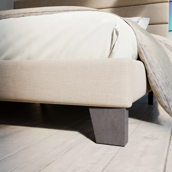 Beige upholstered queen platform bed with tufted headboard and no-box-spring slatted base