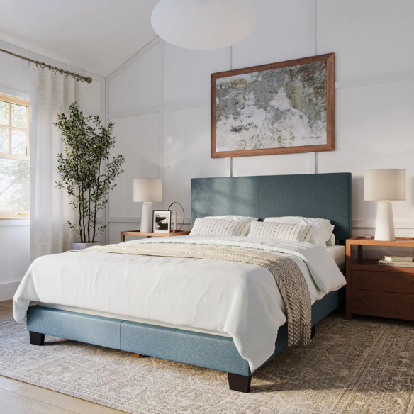 Blue polyester upholstered queen panel bed with tall foam-padded rectangular headboard and wood frame