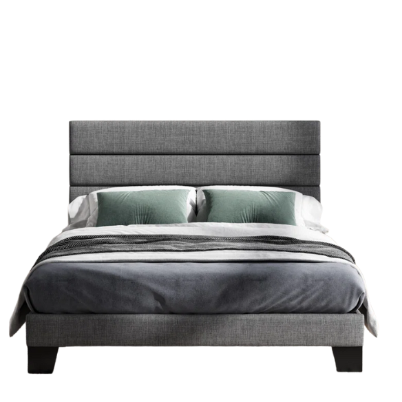 Dark grey upholstered queen platform bed with tufted headboard and wood slat support system