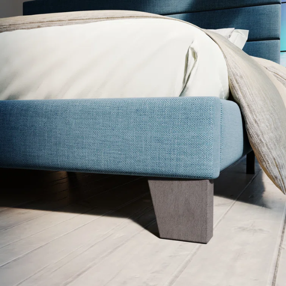 Deep blue upholstered queen platform bed with tufted headboard and slatted wood base, no box spring needed