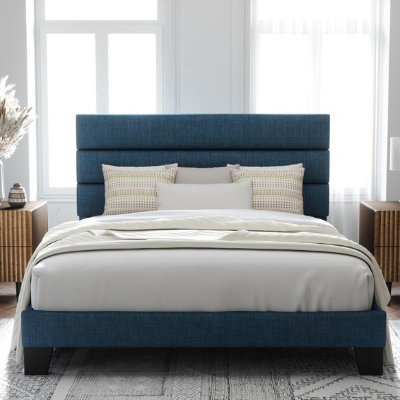 Deep blue upholstered queen platform bed with tufted headboard and slatted wood base, no box spring needed