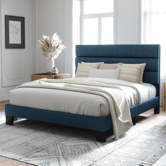 Deep blue upholstered queen platform bed with tufted headboard and slatted wood base, no box spring needed