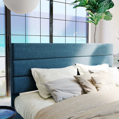 Deep blue upholstered queen platform bed with tufted headboard and slatted wood base, no box spring needed