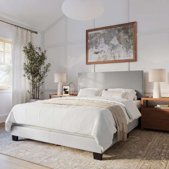 Light grey polyester upholstered queen panel bed with foam-padded headboard and wood frame, box spring required