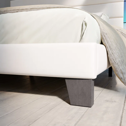 White upholstered queen platform bed with tufted headboard and wood slat base, no box spring required